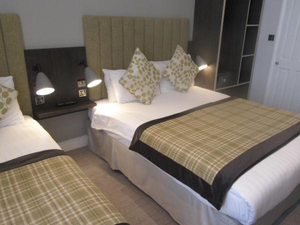 Garden Court Hotel : photo 3 de la chambre chambre deluxe avec 2 lits queen-size