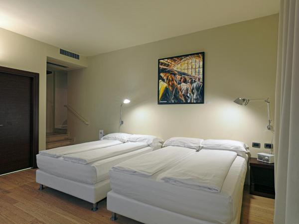 I Portici Hotel Bologna : photo 3 de la chambre chambre lits jumeaux supérieure