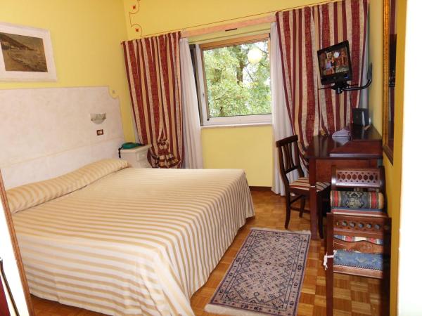 Ai Ronchi Motor Hotel Brescia : photo 2 de la chambre chambre familiale (2 adultes et 2 enfants)