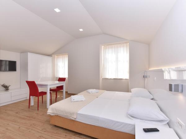 Idassa Atrium rooms : photo 9 de la chambre chambre double ou lits jumeaux avec balcon