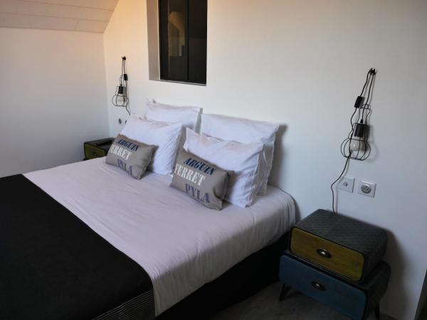 Hôtel Villa Teranga : photo 1 de la chambre suite lit queen-size