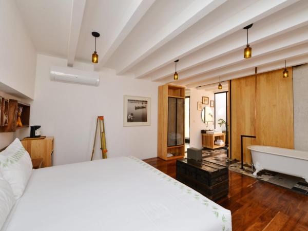 Hotel Los Amantes : photo 9 de la chambre suite supérieure lit king-size