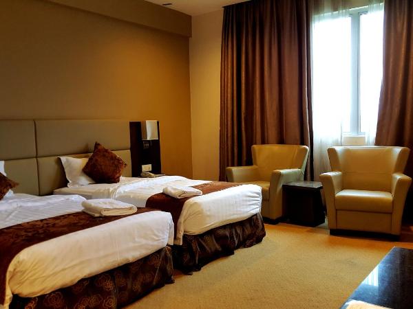 Lintas View Hotel : photo 3 de la chambre chambre lits jumeaux exécutive