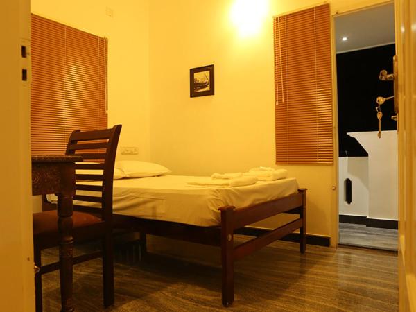 Janatha Homestay : photo 9 de la chambre petite chambre double