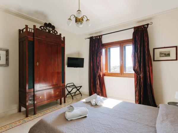 Dimora Archimedea : photo 1 de la chambre chambre quadruple premium
