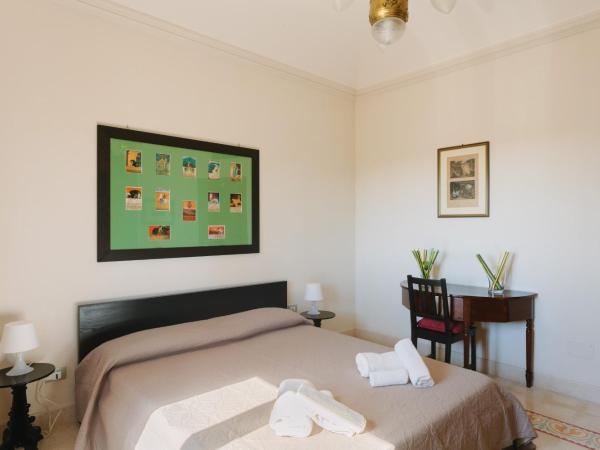 Dimora Archimedea : photo 4 de la chambre chambre quadruple premium