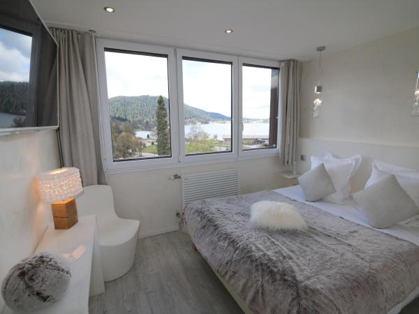 Les Loges Du Parc : photo 1 de la chambre suite avec sauna - vue sur lac - ours