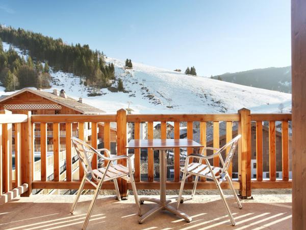 Hôtel Prestige Odalys Le Chamois : photo 1 de la chambre chambre double standard