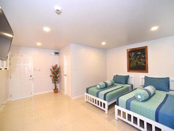 Parvena Hotel Sathorn : photo 1 de la chambre chambre lits jumeaux standard