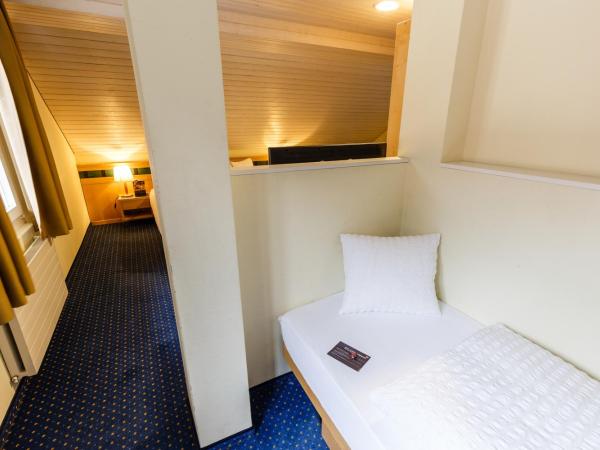 Arenas Resort Victoria-Lauberhorn : photo 3 de la chambre chambre familiale