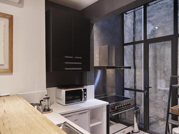 La Résidence Arles Centre : photo 6 de la chambre appartement en duplex - 1er Étage côté rue