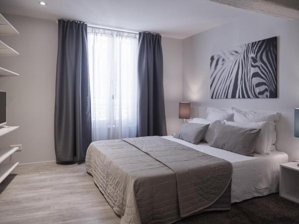 La Résidence Arles Centre : photo 1 de la chambre appartement en duplex - 1er Étage côté rue