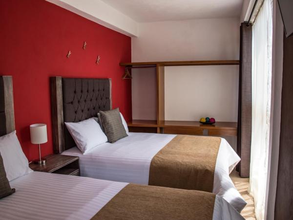 Hotel Casa Aurora : photo 5 de la chambre chambre avec 2 grands lits queen-size