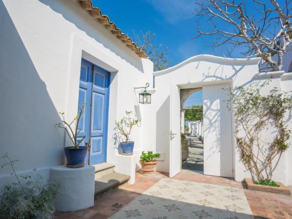 Tenuta Del Poggio Antico : photo 6 de la chambre suite supérieure avec jardin privé