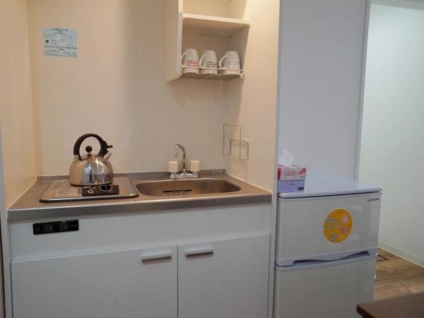 Osaka Tsuruhashitei Hotel Asahi group 大阪鶴橋亭ホテル : photo 7 de la chambre chambre quadruple avec salle de bains privative