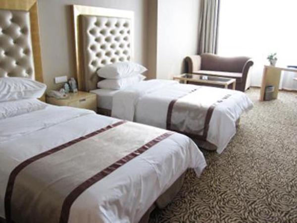 Glarun Jinling Hotel : photo 1 de la chambre chambre lits jumeaux supérieure