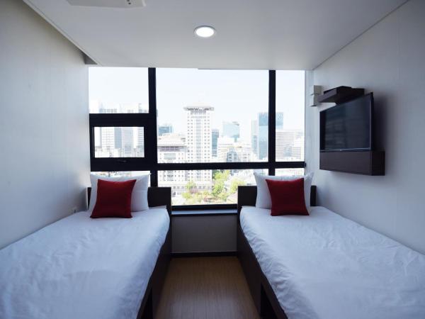 57 Myeongdong Hostel : photo 9 de la chambre chambre lits jumeaux standard