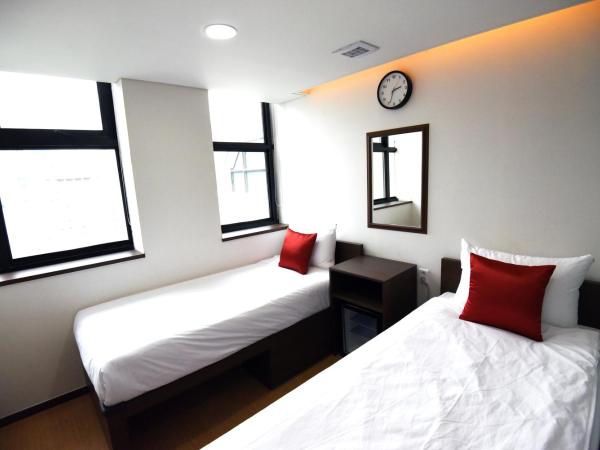 57 Myeongdong Hostel : photo 7 de la chambre chambre lits jumeaux standard