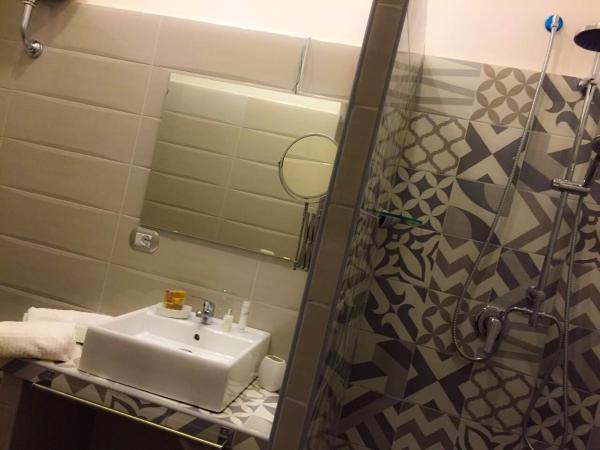 B&B Central Station Suite : photo 4 de la chambre chambre quadruple avec balcon