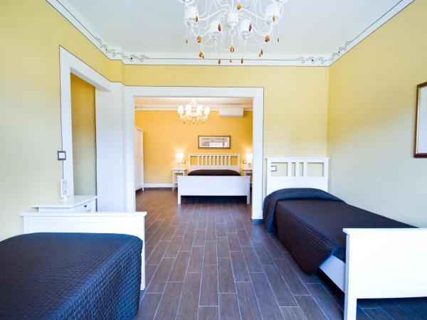 Hotel Pisa Tower : photo 3 de la chambre chambre quadruple Économique - bâtiment séparé