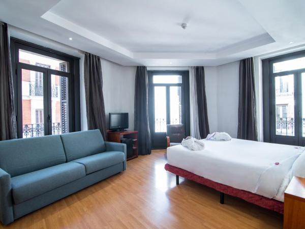 Petit Palace Preciados : photo 2 de la chambre chambre lit king-size deluxe - vue sur ville