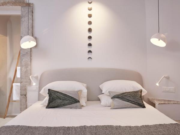 Cosmopolitan Suites - Small Luxury Hotels of the World : photo 2 de la chambre chambre supérieure cosmo - vue sur volcan