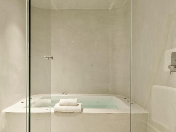 Cosmopolitan Suites - Small Luxury Hotels of the World : photo 5 de la chambre suite cosmo - vue sur volcan