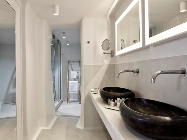 Cosmopolitan Suites - Small Luxury Hotels of the World : photo 6 de la chambre suite cosmo - vue sur volcan