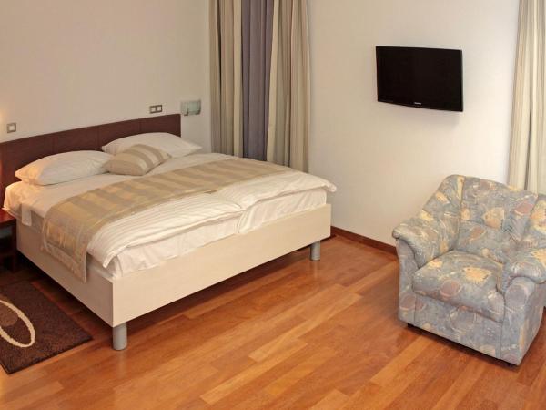 Hotel Monika : photo 1 de la chambre chambre double supérieure