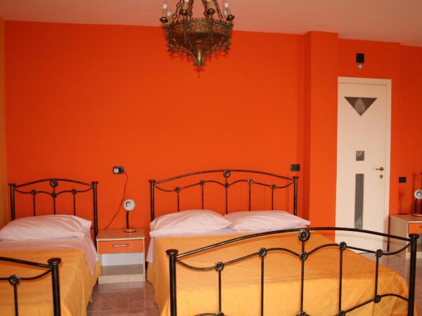 B&B Viale delle Colline : photo 10 de la chambre chambre quadruple