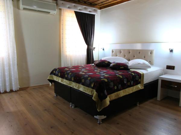 Bacchus Pension : photo 10 de la chambre chambre double ou lits jumeaux supérieure