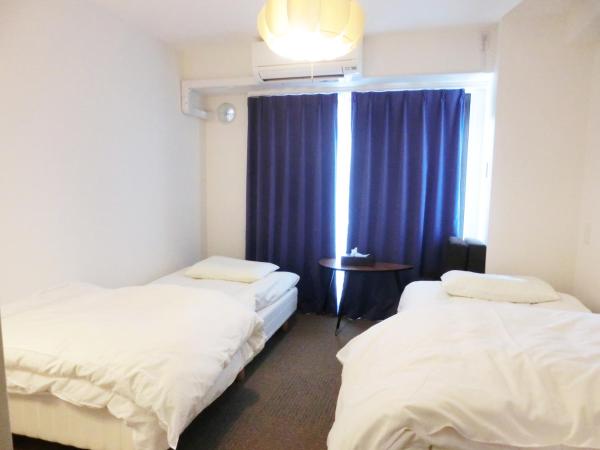 Guesthouse TOHO : photo 4 de la chambre chambre lits jumeaux Économique