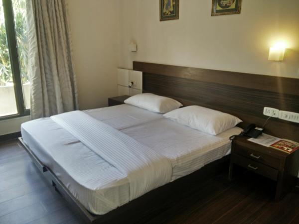 Enkay Residency M-Block Cyber City : photo 3 de la chambre suite