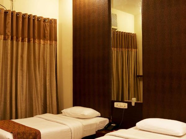 Enkay Residency M-Block Cyber City : photo 2 de la chambre chambre lits jumeaux supérieure