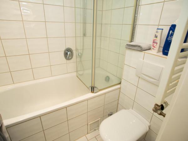 Apartement mit Dachterrasse - bei Curth klingen - Teilen Sie uns Ihre Ankunfszeit mit : photo 3 de la chambre appartement