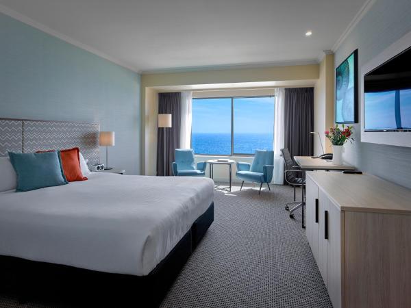 Stamford Grand Adelaide : photo 1 de la chambre grand hébergement lit king-size océan