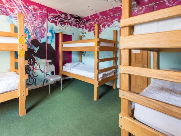 The Full Moon Backpackers : photo 2 de la chambre bed in 8-bed mixed dormitory room sleeps 8