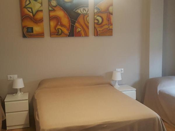 Pension Yna Holiday : photo 7 de la chambre chambre quadruple avec salle de bains commune