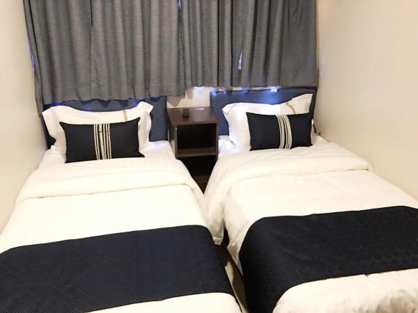 California Hotel : photo 2 de la chambre chambre lits jumeaux