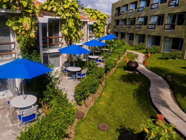 Casa del Mar Cozumel Hotel & Dive Resort : photo 6 de la chambre cabine de luxe avec terrasse - vue sur jardin
