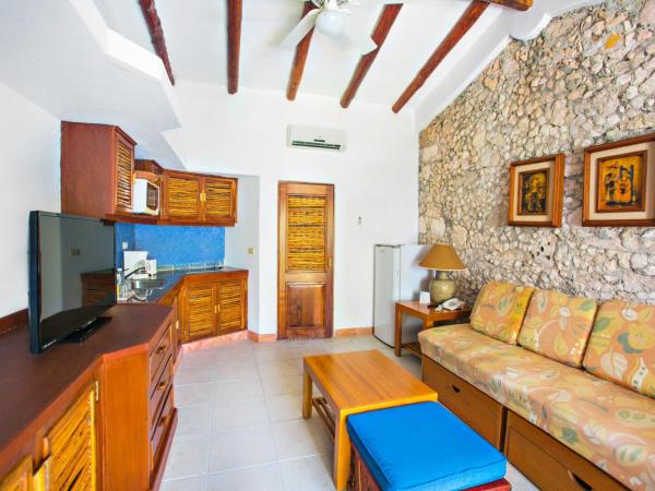 Casa del Mar Cozumel Hotel & Dive Resort : photo 2 de la chambre cabine de luxe avec terrasse - vue sur jardin