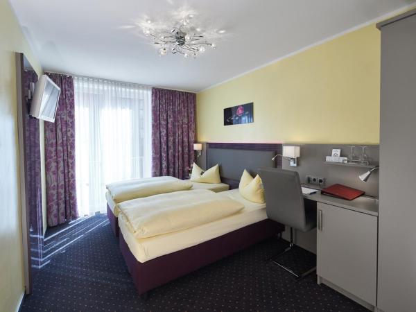 Hotel Alfa Zentrum : photo 6 de la chambre chambre double confort - vue sur cour ou sur rue