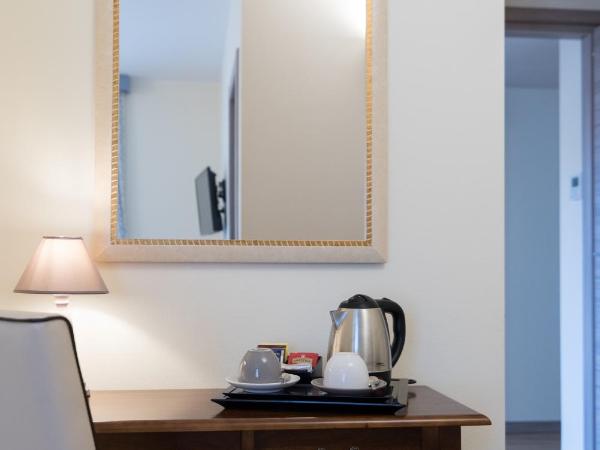 Relais Dei Mandorli : photo 7 de la chambre chambre triple avec salle de bains privative