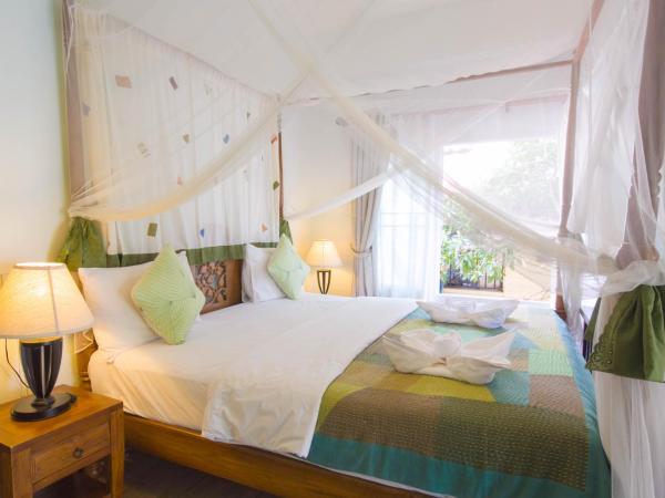 Changmoi House (Little Village) : photo 4 de la chambre chambre lit king-size - vue sur temple