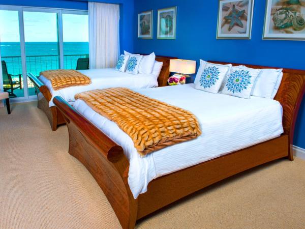 Sea View Hotel : photo 1 de la chambre suite junior avec lits doubles et kitchenette