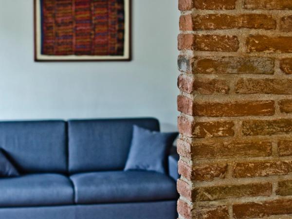 Relais Villa Ambrosetti : photo 2 de la chambre suite - vue sur jardin