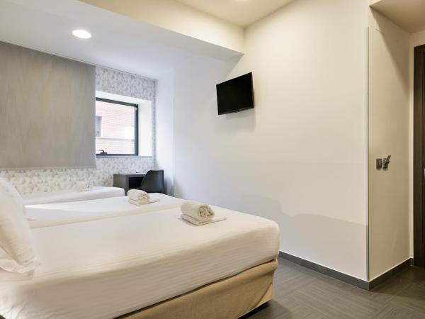 Hotel Acta Laumon : photo 2 de la chambre chambre triple (3 adultes)