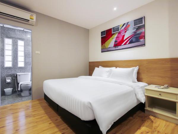 Pula Silom : photo 4 de la chambre chambre deluxe double ou lits jumeaux