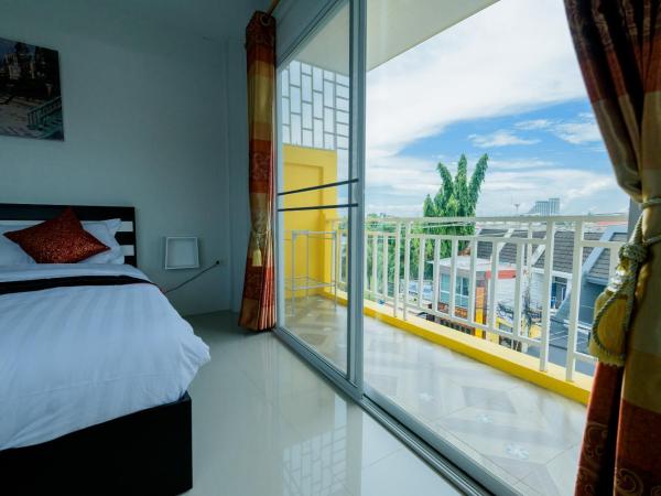 Lemon Loft Boutique Room : photo 1 de la chambre chambre triple avec balcon