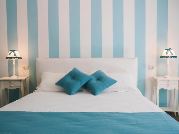 Les Suites Magnolia : photo 2 de la chambre chambre double supérieure